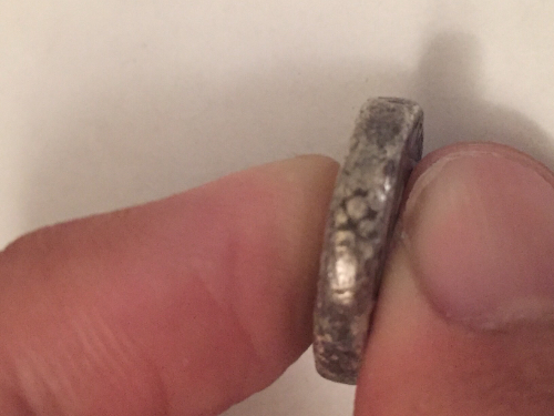 What-Are-The-Marks-On-The-Side-Of-This-Coin?